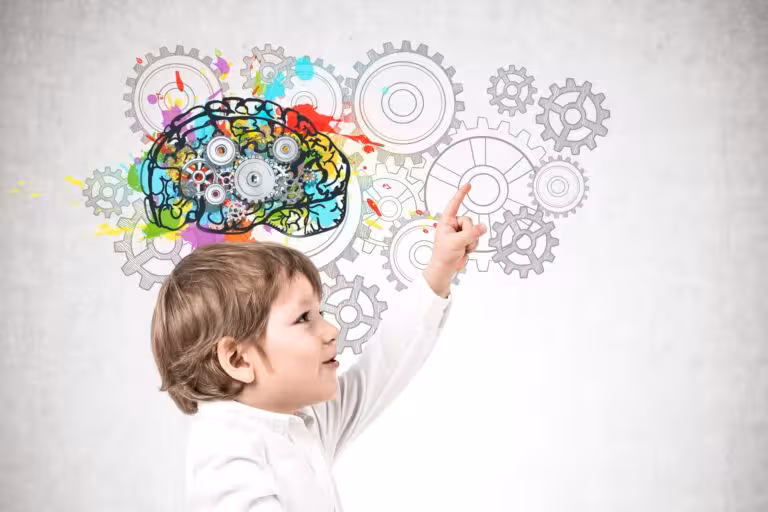 Little boy showing brain sketch, thinking