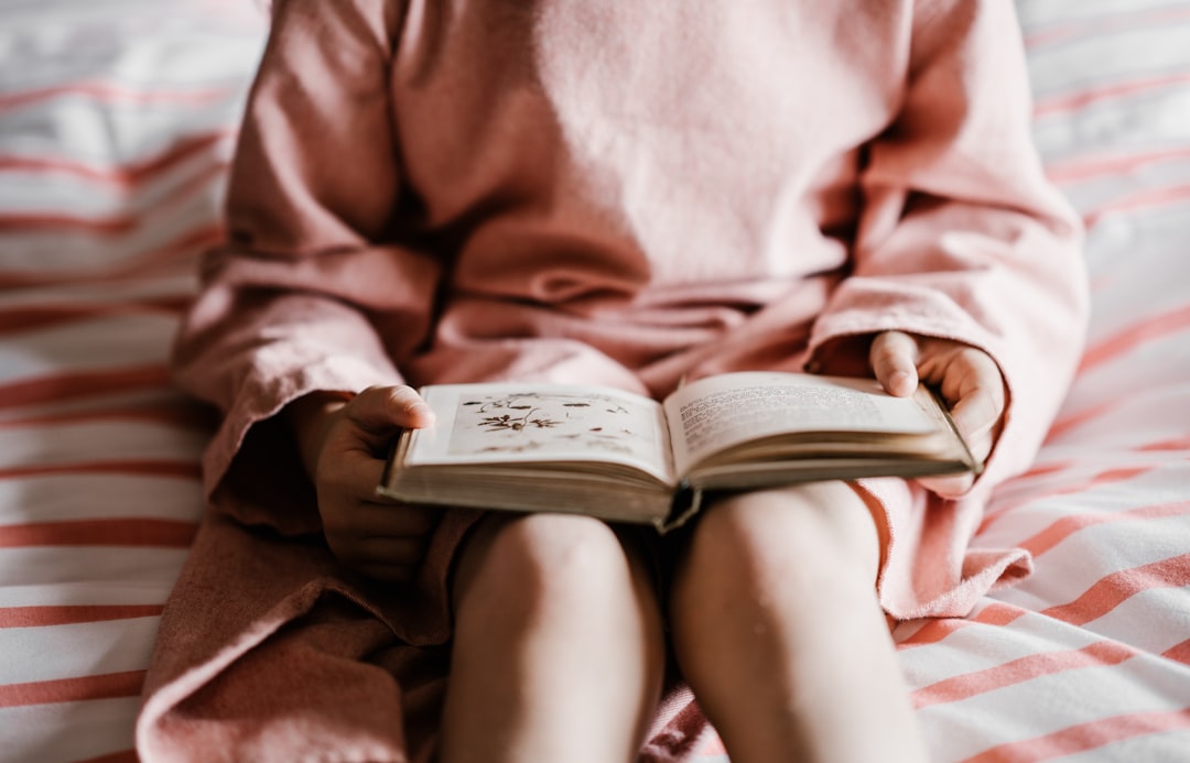 child reading book