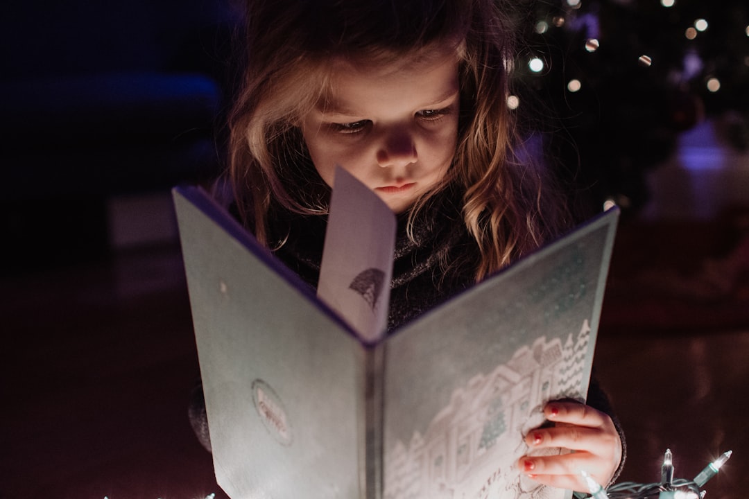 child reading book