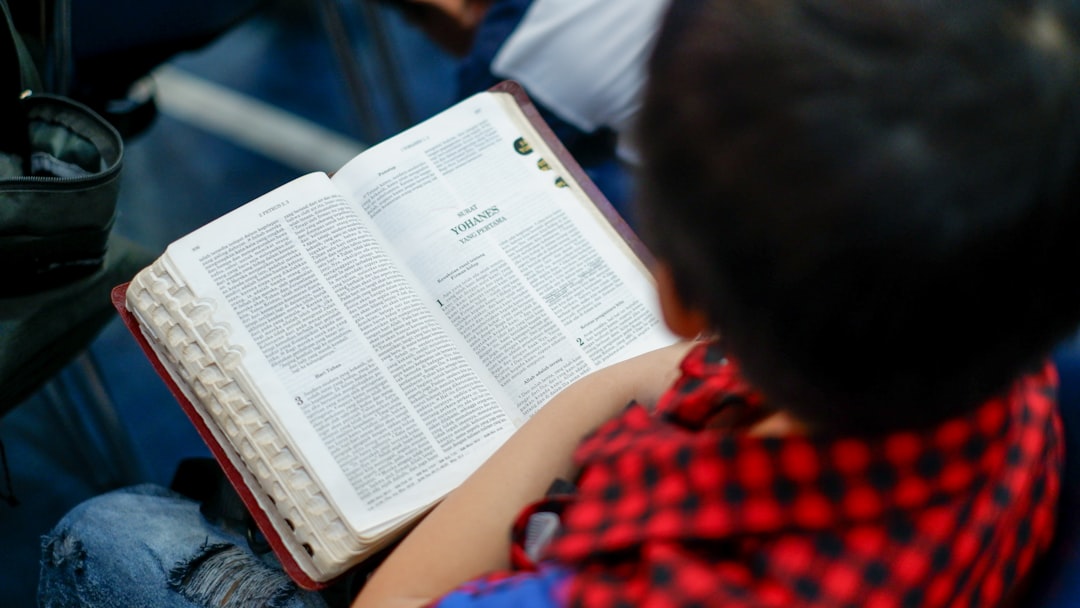 child reading book