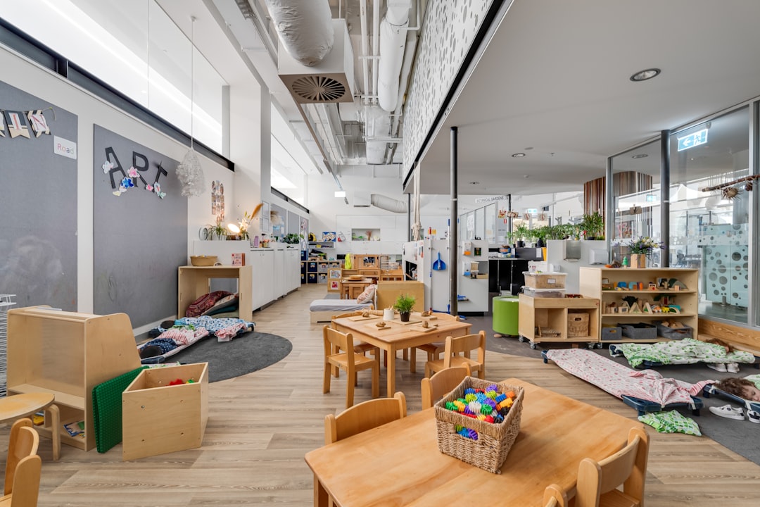 A room filled with lots of wooden tables and chairs